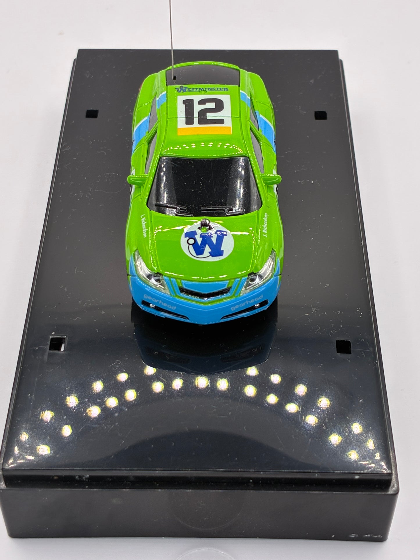 Westminister World's Smallest RC Car #12 Green Diecast 1:64 Size in Acrylic Case.