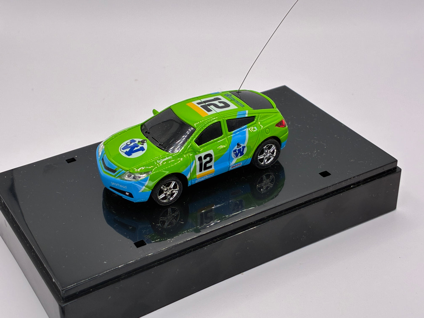 Westminister World's Smallest RC Car #12 Green Diecast 1:64 Size in Acrylic Case.