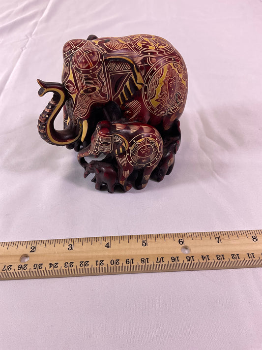 Diane C. Norris Red Wooden Elephant Family