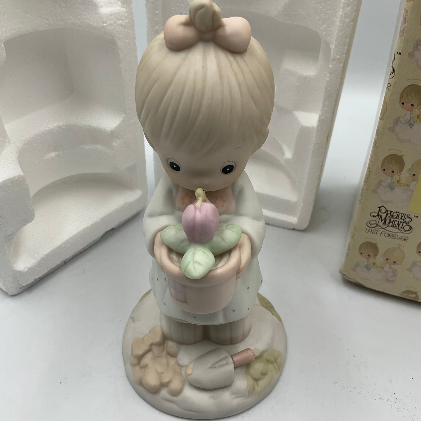 Precious Moments May Figurine