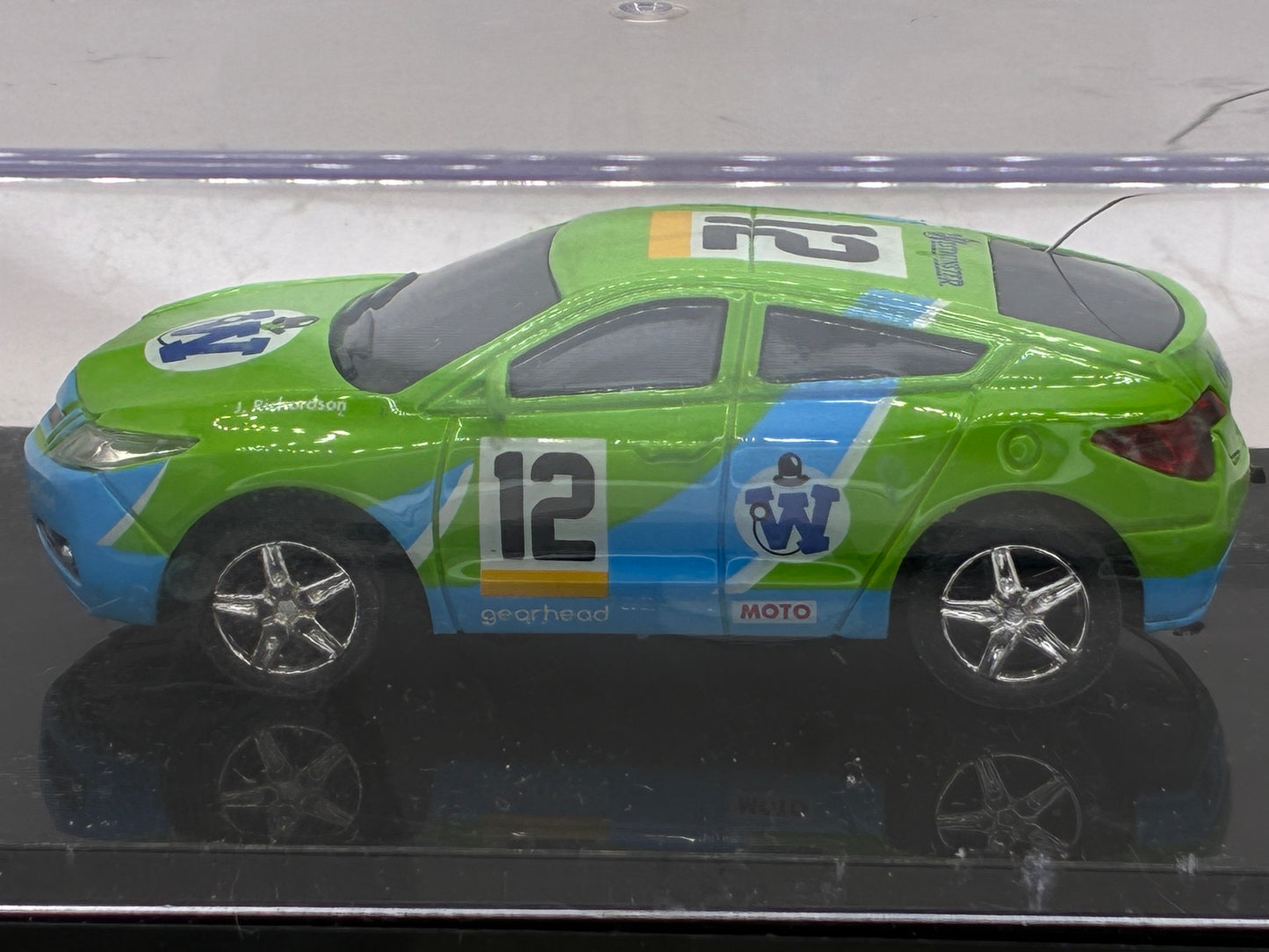 Westminister World's Smallest RC Car #12 Green Diecast 1:64 Size in Acrylic Case.