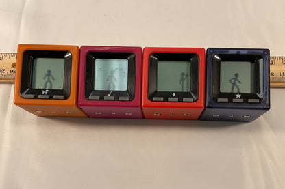 Radica Cube World Set of 4 Vintage Handheld Electronic Games Toys Working New Batteries