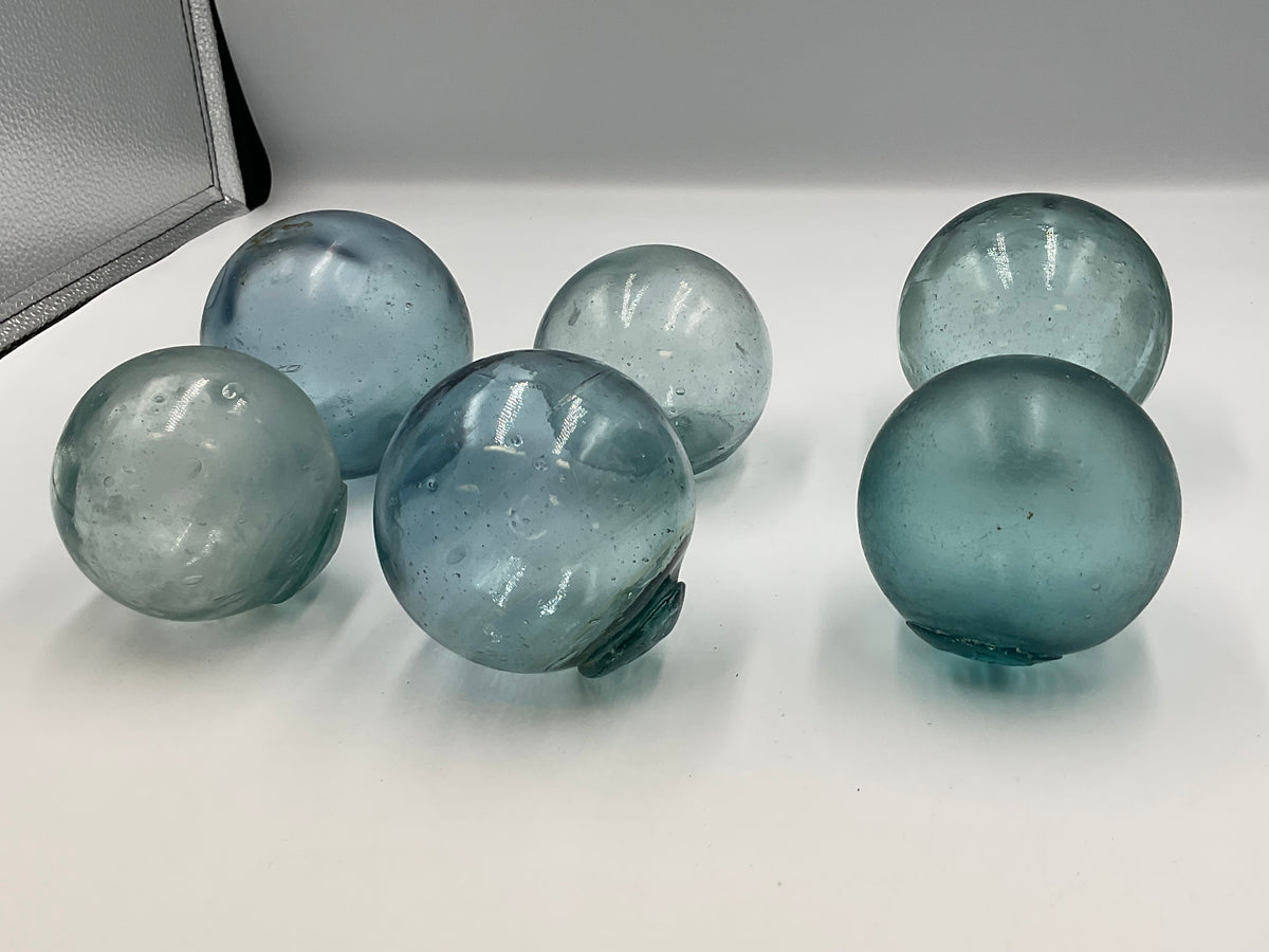 six authentic vintage Japanese Blown Glass Fishing Floats