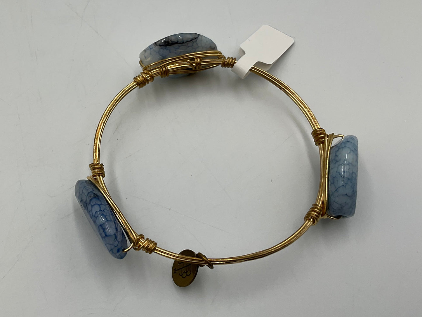 Bourbon and Boweties Bangle Gold Tone Wire Wrapped With Blue Marbled Stones