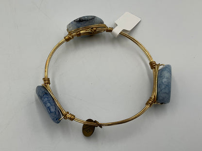 Bourbon and Boweties Bangle Gold Tone Wire Wrapped With Blue Marbled Stones