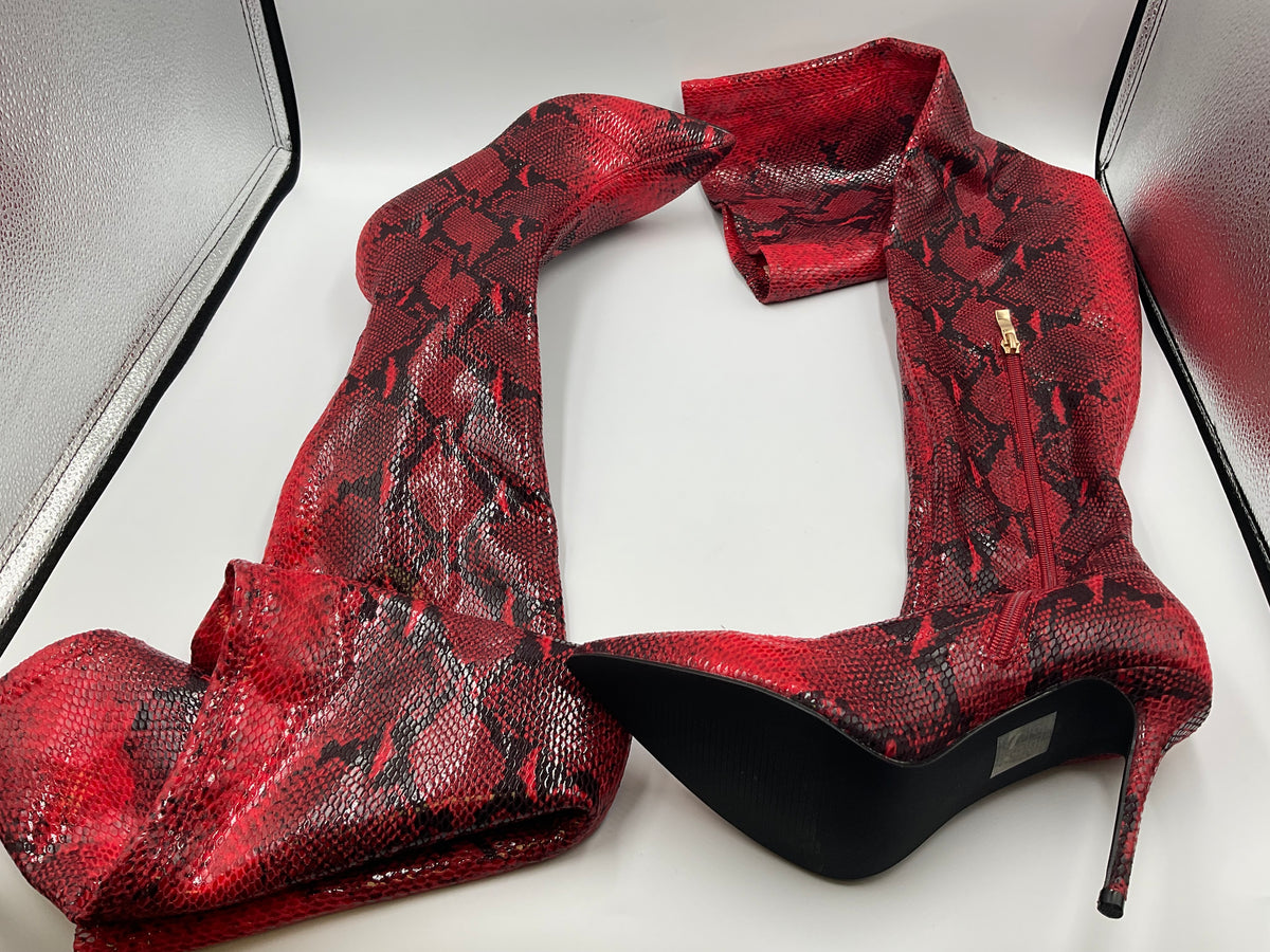 Mei Oi snakeskin-pattern over-the-knee boots