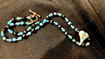 Light and Dark Blue Beaded Necklace with Elongated Heart Shaped Pendant Copper-Tone Bar and Toggle Clasp 22 Inches Length