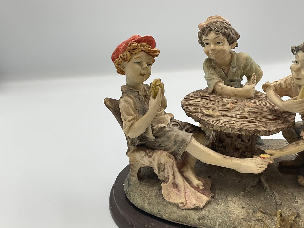 vintage resin sculpture titled "The Cheats" (or "The Cheaters") from the Misubanti Collection