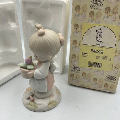 Precious Moments May Figurine