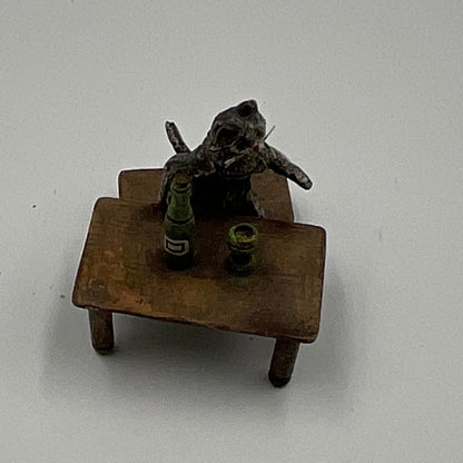 Miniature Cat Drinking at Table collectible figurine