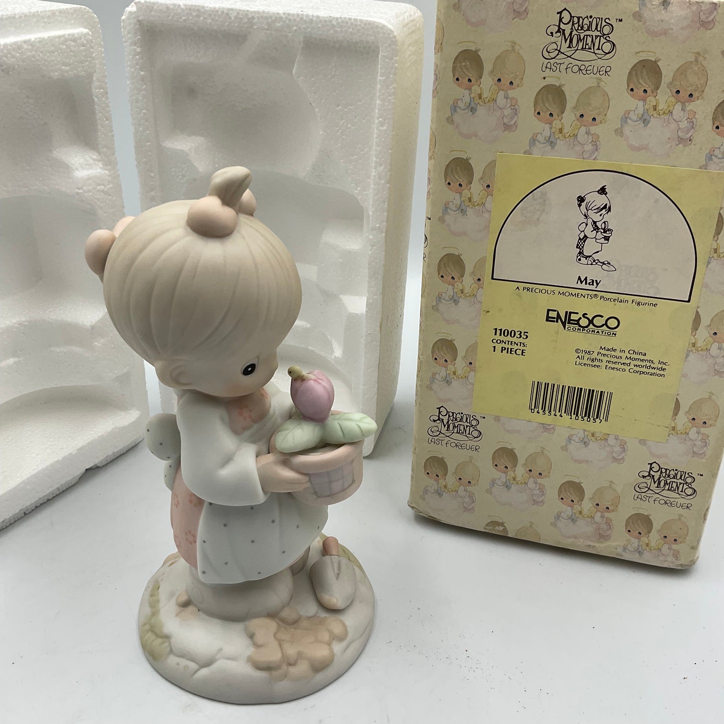 Precious Moments May Figurine