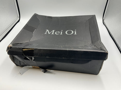 Mei Oi snakeskin-pattern over-the-knee boots