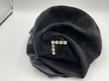Black hat with seven diamonds