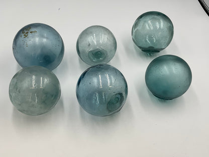 six authentic vintage Japanese Blown Glass Fishing Floats