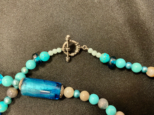 Light and Dark Blue Beaded Necklace with Elongated Heart Shaped Pendant Copper-Tone Bar and Toggle Clasp 22 Inches Length