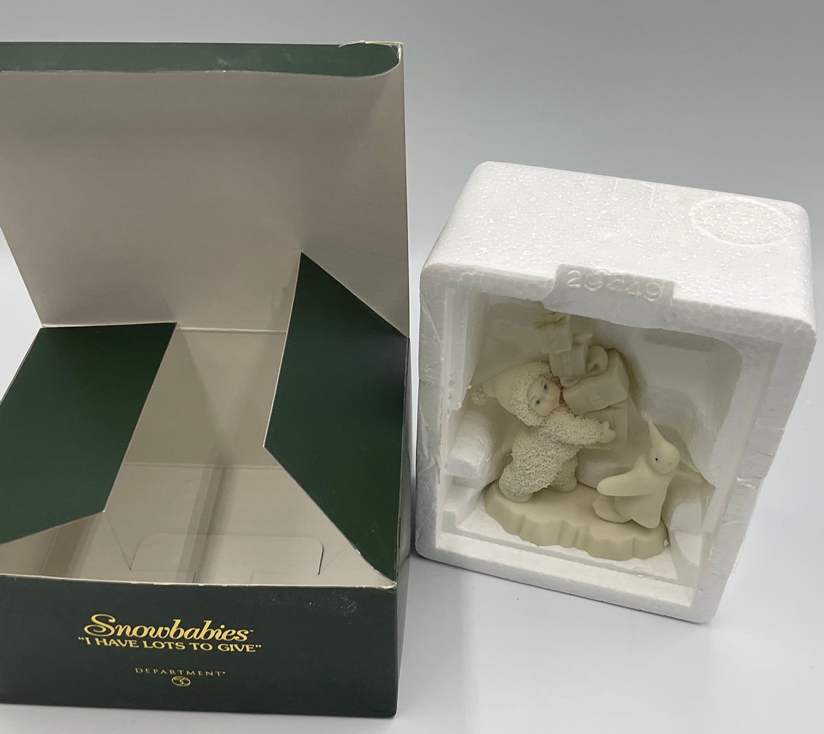 Department 56 Snowbuddies I have Lots To Give 05975 Retired figurine 2002