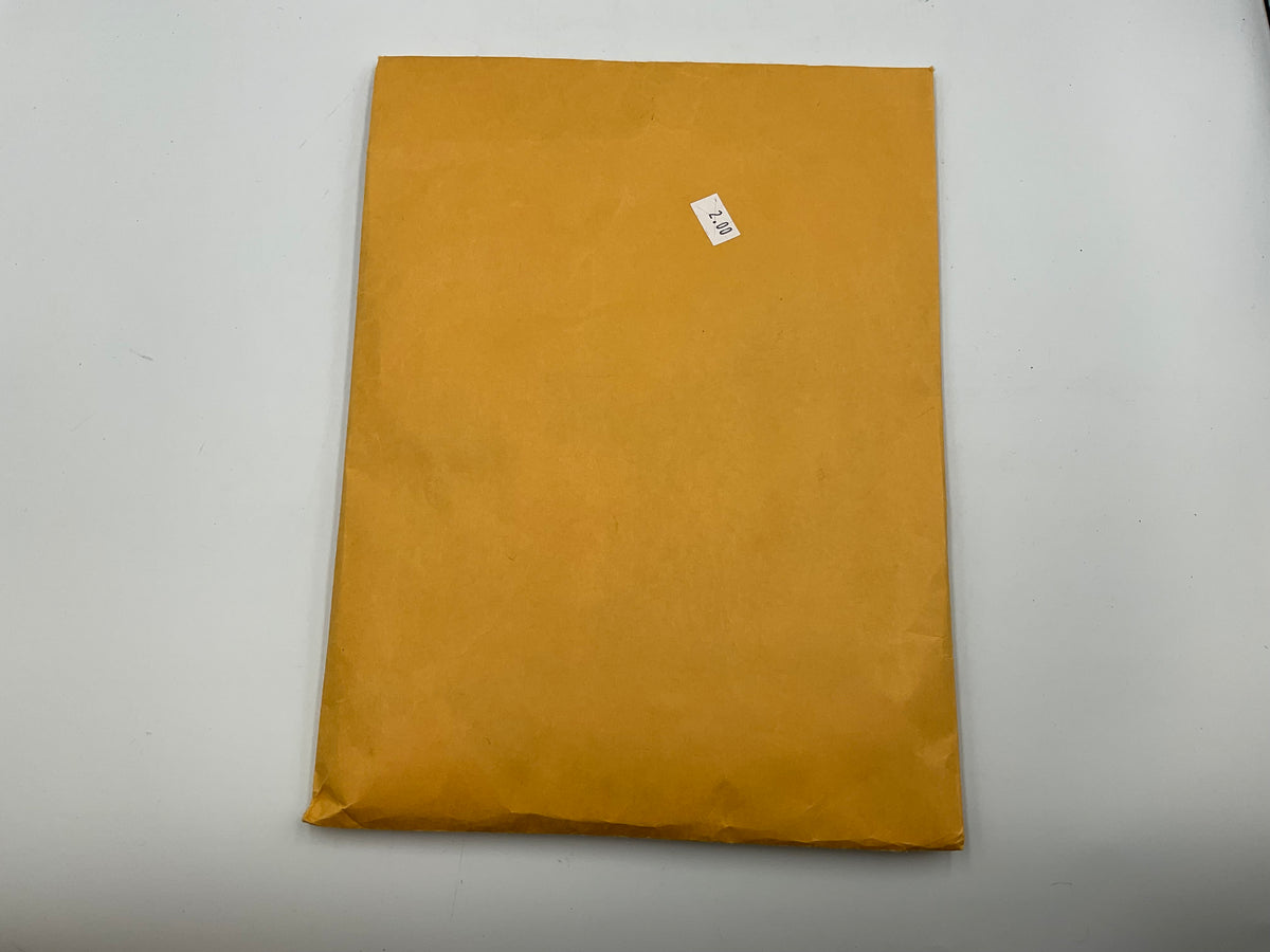 Orange Kraft Envelope With With Vintage Post Stamps