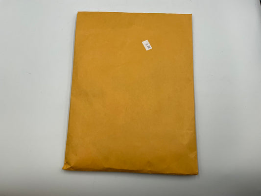 Orange Kraft Envelope With With Vintage Post Stamps