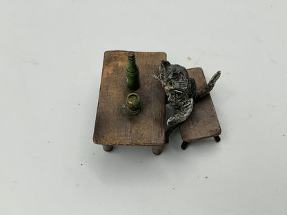 Miniature Cat Drinking at Table collectible figurine