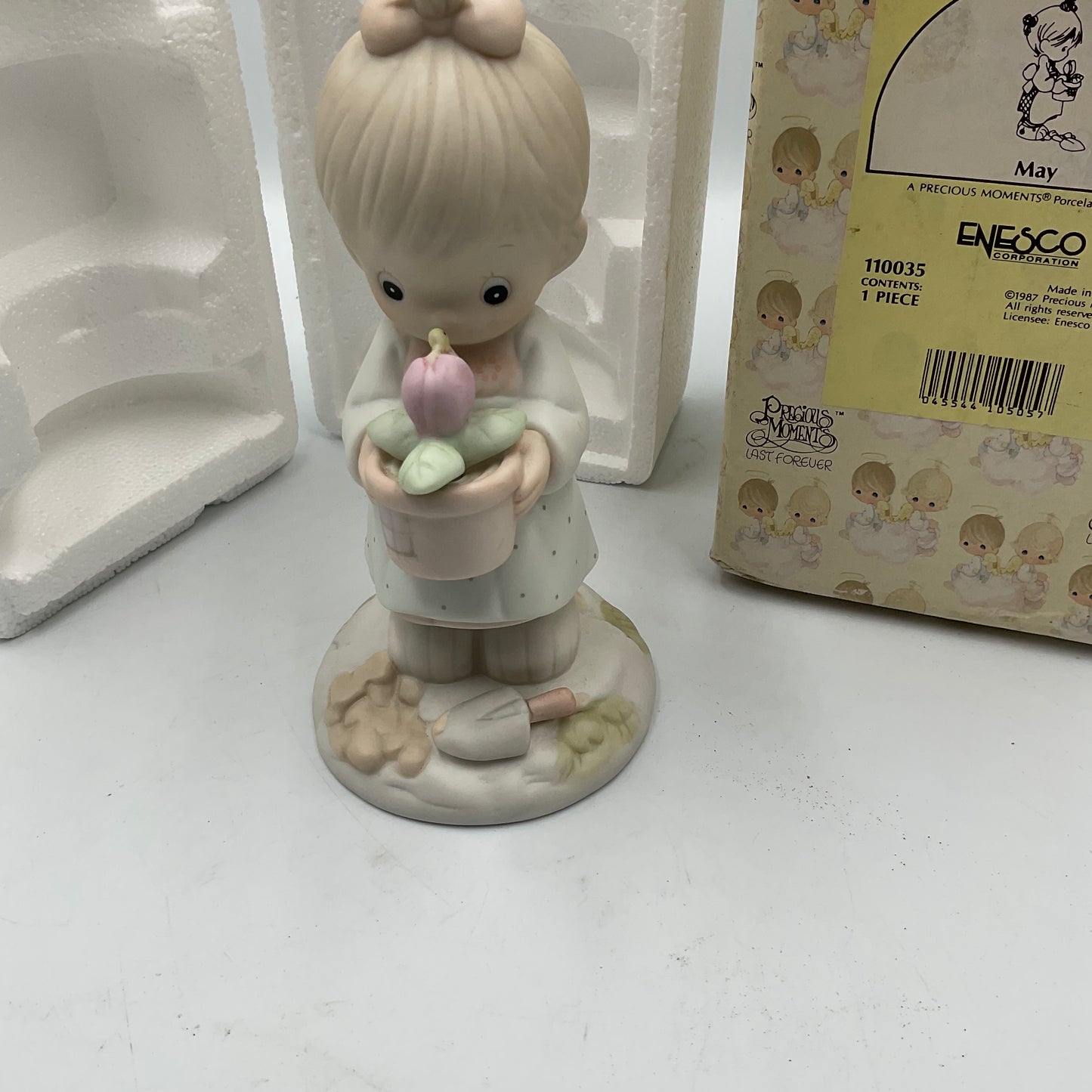 Precious Moments May Figurine
