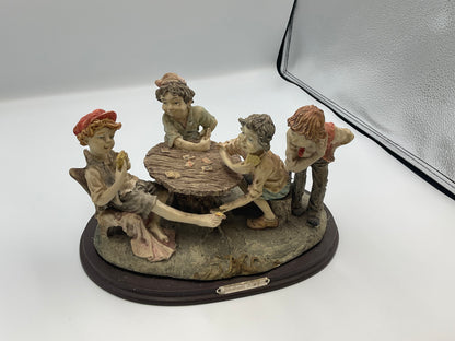 vintage resin sculpture titled "The Cheats" (or "The Cheaters") from the Misubanti Collection