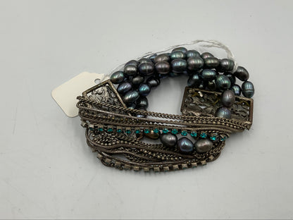 Silverstone Multi Strand Bracelet With Teal Colored Stones