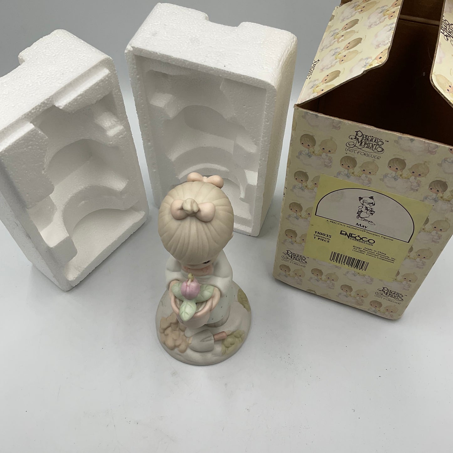 Precious Moments May Figurine