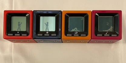 Radica Cube World Set of 4 Vintage Handheld Electronic Games Toys Working New Batteries