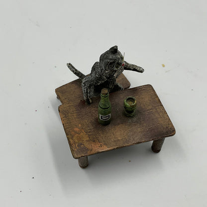Miniature Cat Drinking at Table collectible figurine