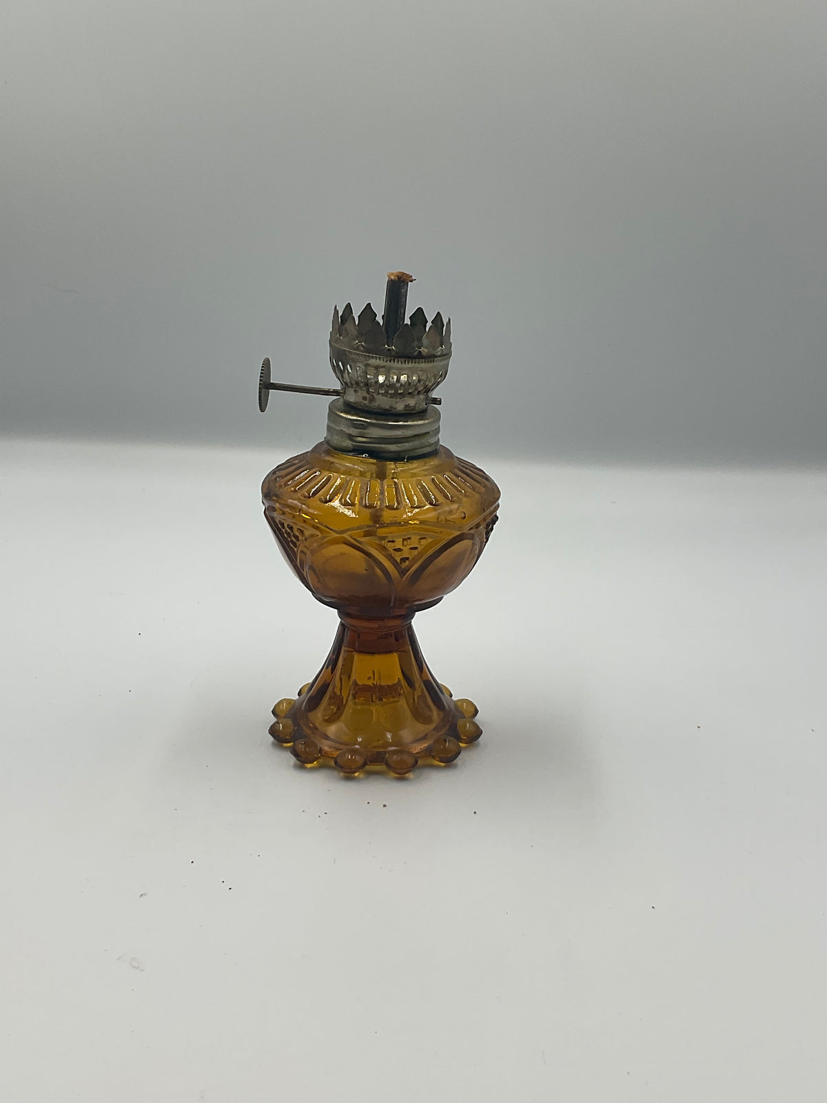vintage amber pressed glass miniature oil lamp base and removable glass fuel reservoir