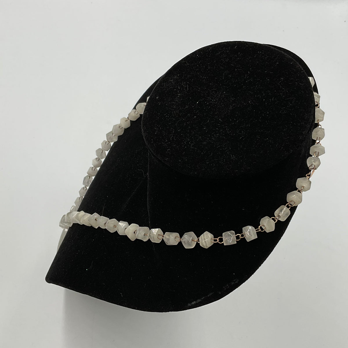 White Stone Face Design Necklace