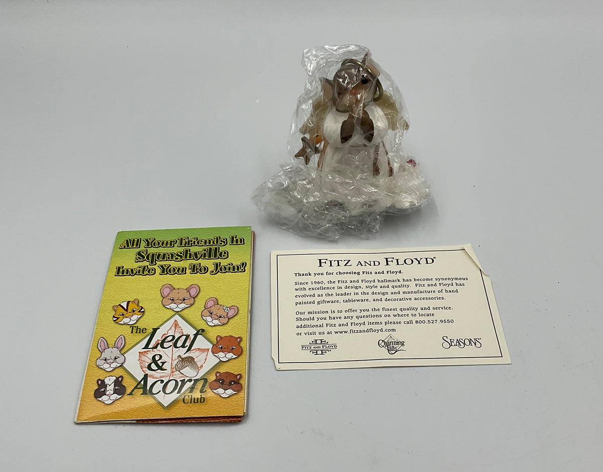 Collectible figurine kit from the Charming Tails collection by Fitz and Floyd