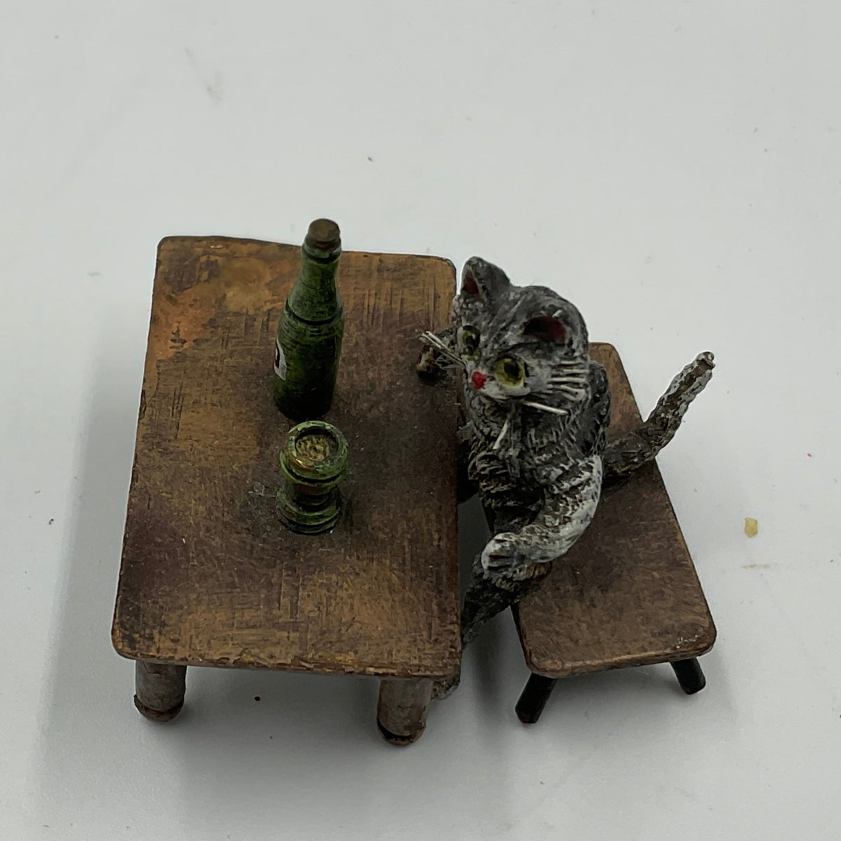Miniature Cat Drinking at Table collectible figurine