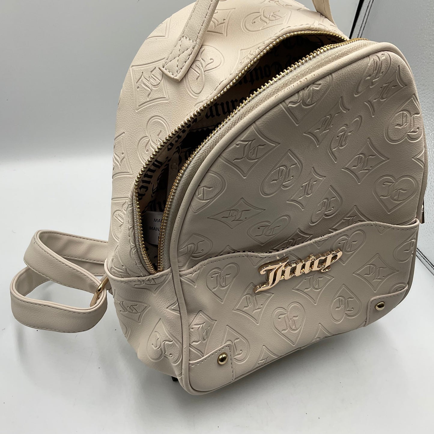 Juicy Couture monogram debossed mini backpack