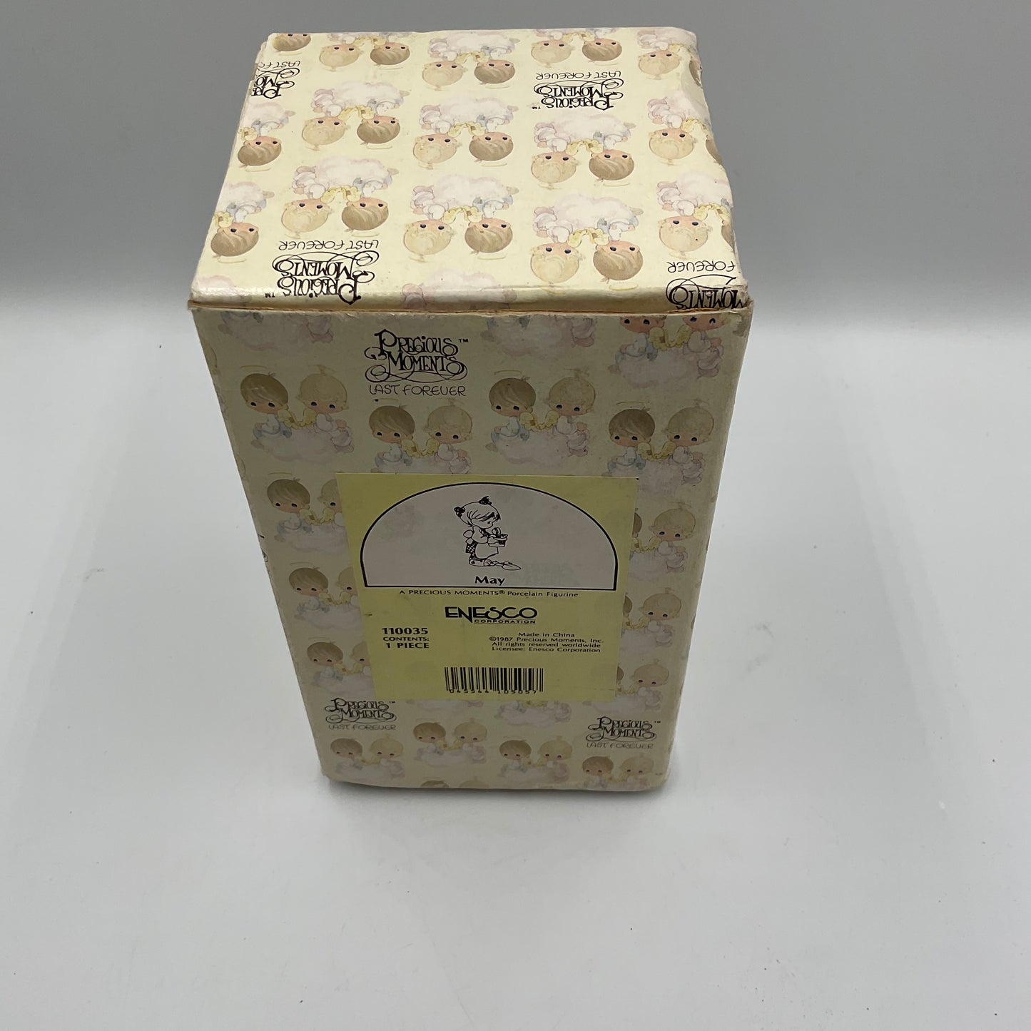 Precious Moments May Figurine