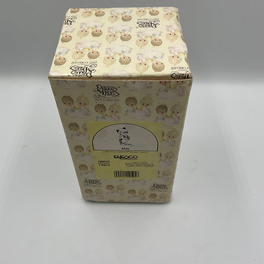 Precious Moments May Figurine