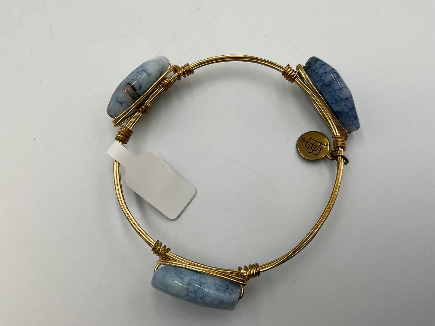 Bourbon and Boweties Bangle Gold Tone Wire Wrapped With Blue Marbled Stones