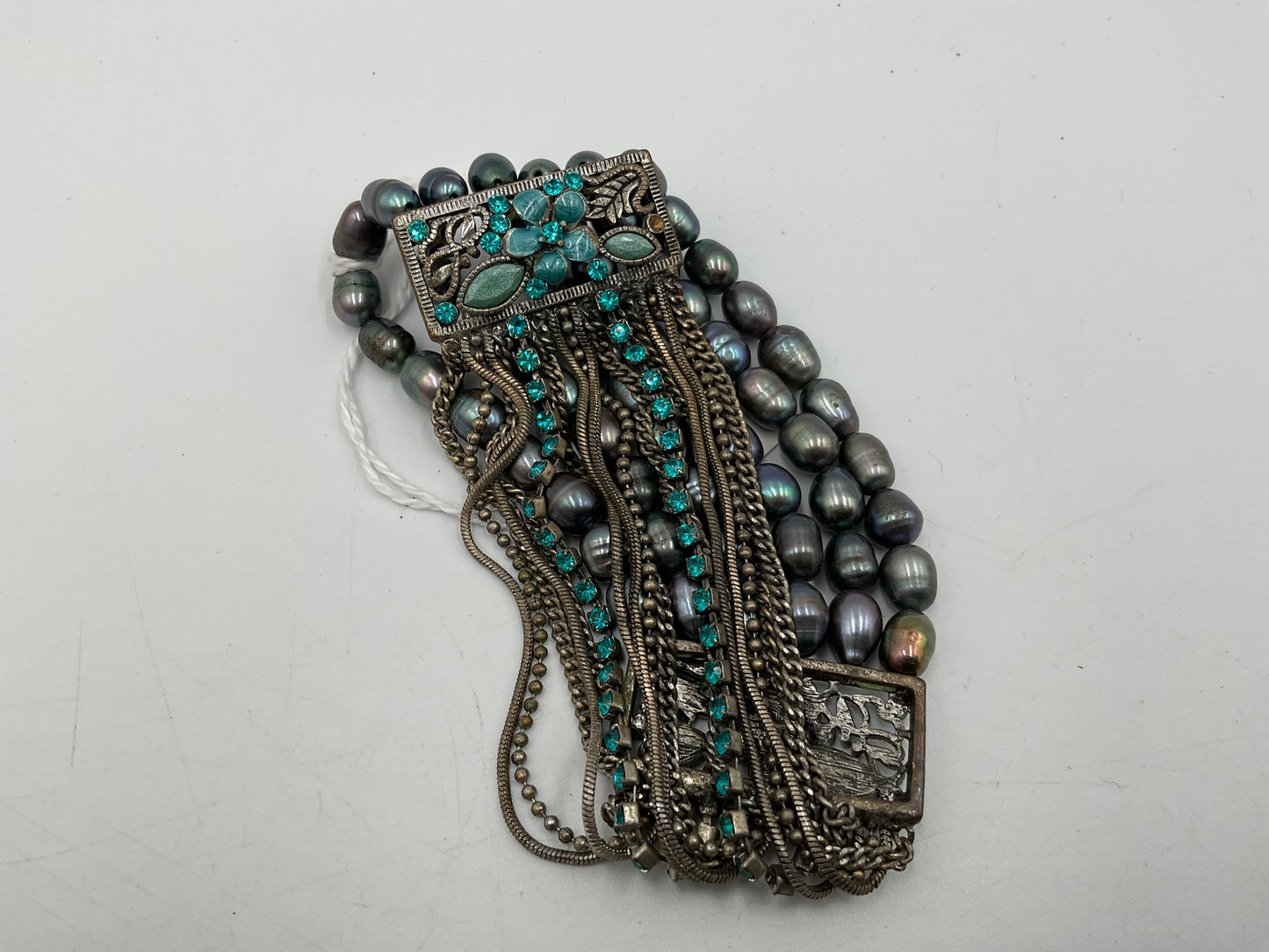 Silverstone Multi Strand Bracelet With Teal Colored Stones