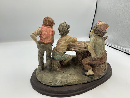 vintage resin sculpture titled "The Cheats" (or "The Cheaters") from the Misubanti Collection