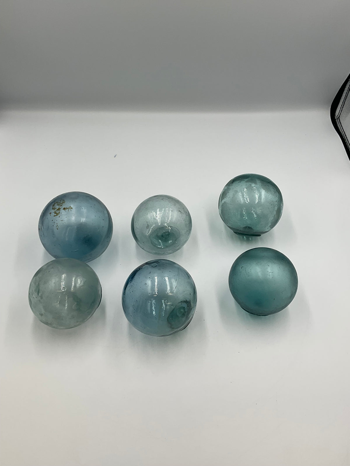 six authentic vintage Japanese Blown Glass Fishing Floats