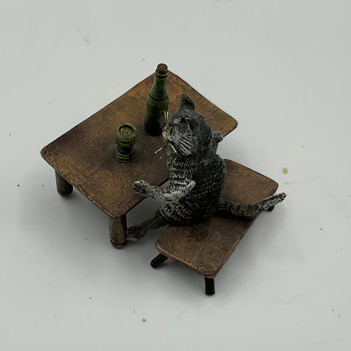 Miniature Cat Drinking at Table collectible figurine