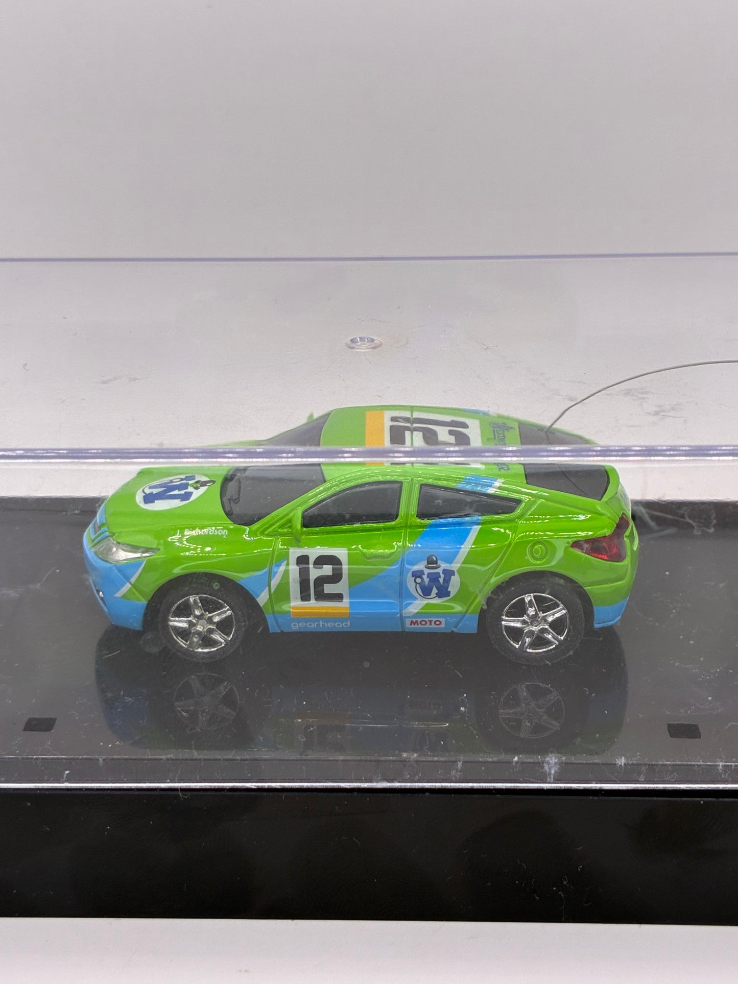 Westminister World's Smallest RC Car #12 Green Diecast 1:64 Size in Acrylic Case.