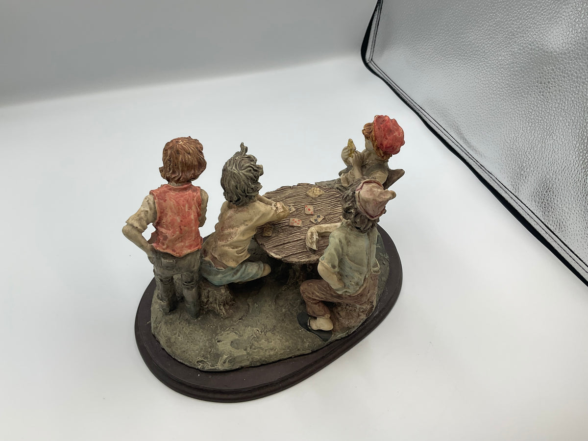 vintage resin sculpture titled "The Cheats" (or "The Cheaters") from the Misubanti Collection