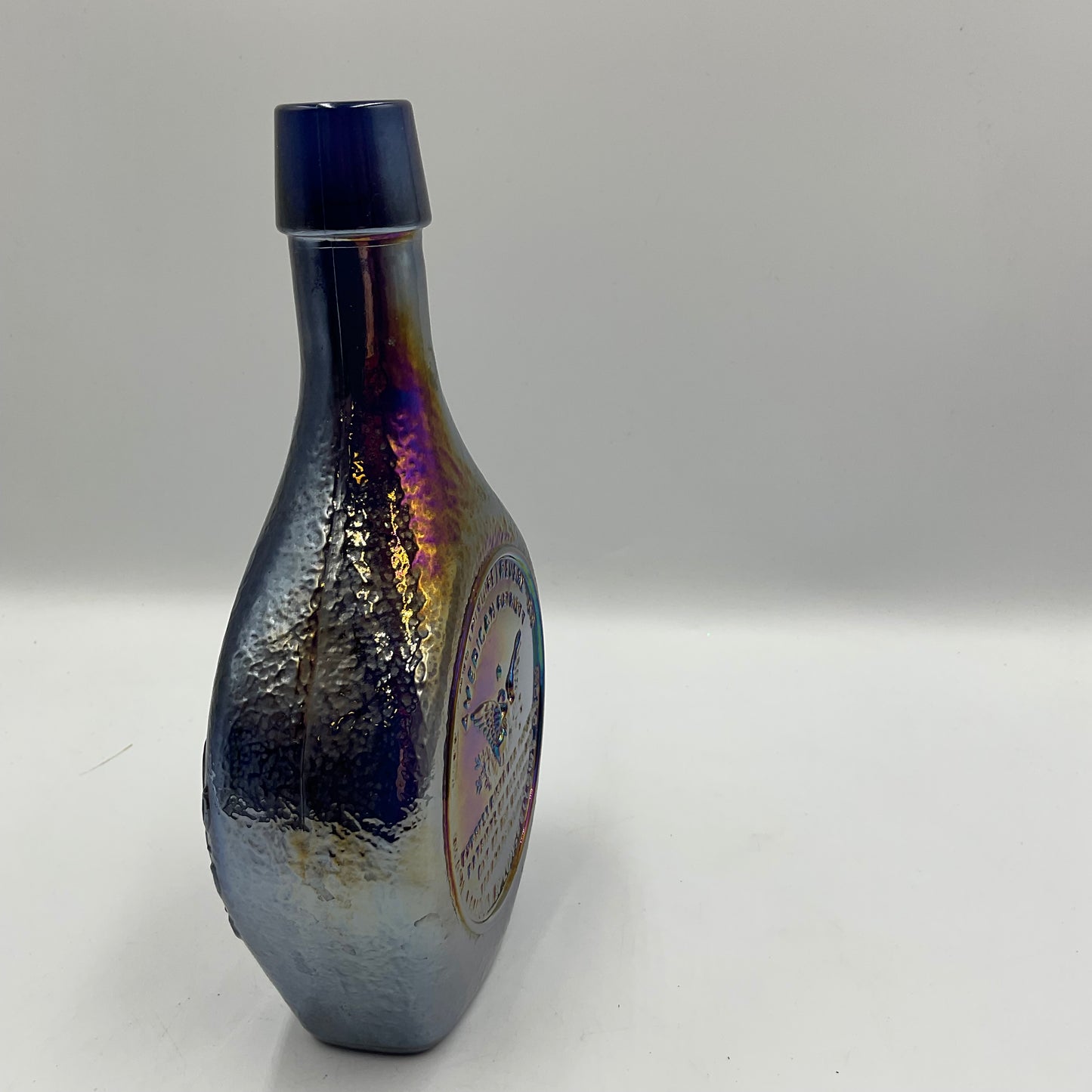 Vintage Wheaton “Great American Series”Blue Iridescent Carnival Glass Bottle