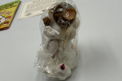 Collectible figurine kit from the Charming Tails collection by Fitz and Floyd
