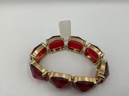 Gold Tone Bracelet with Red stones