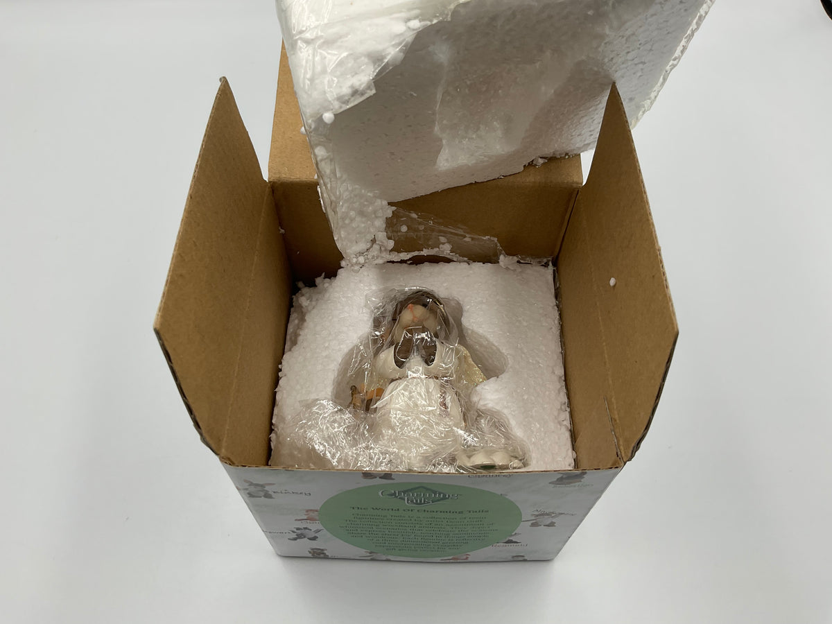 Collectible figurine kit from the Charming Tails collection by Fitz and Floyd