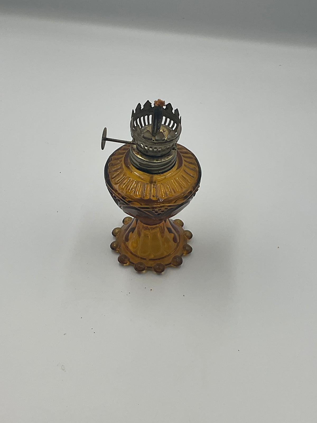 vintage amber pressed glass miniature oil lamp base and removable glass fuel reservoir