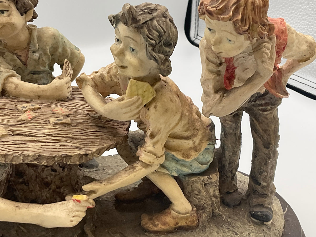 vintage resin sculpture titled "The Cheats" (or "The Cheaters") from the Misubanti Collection