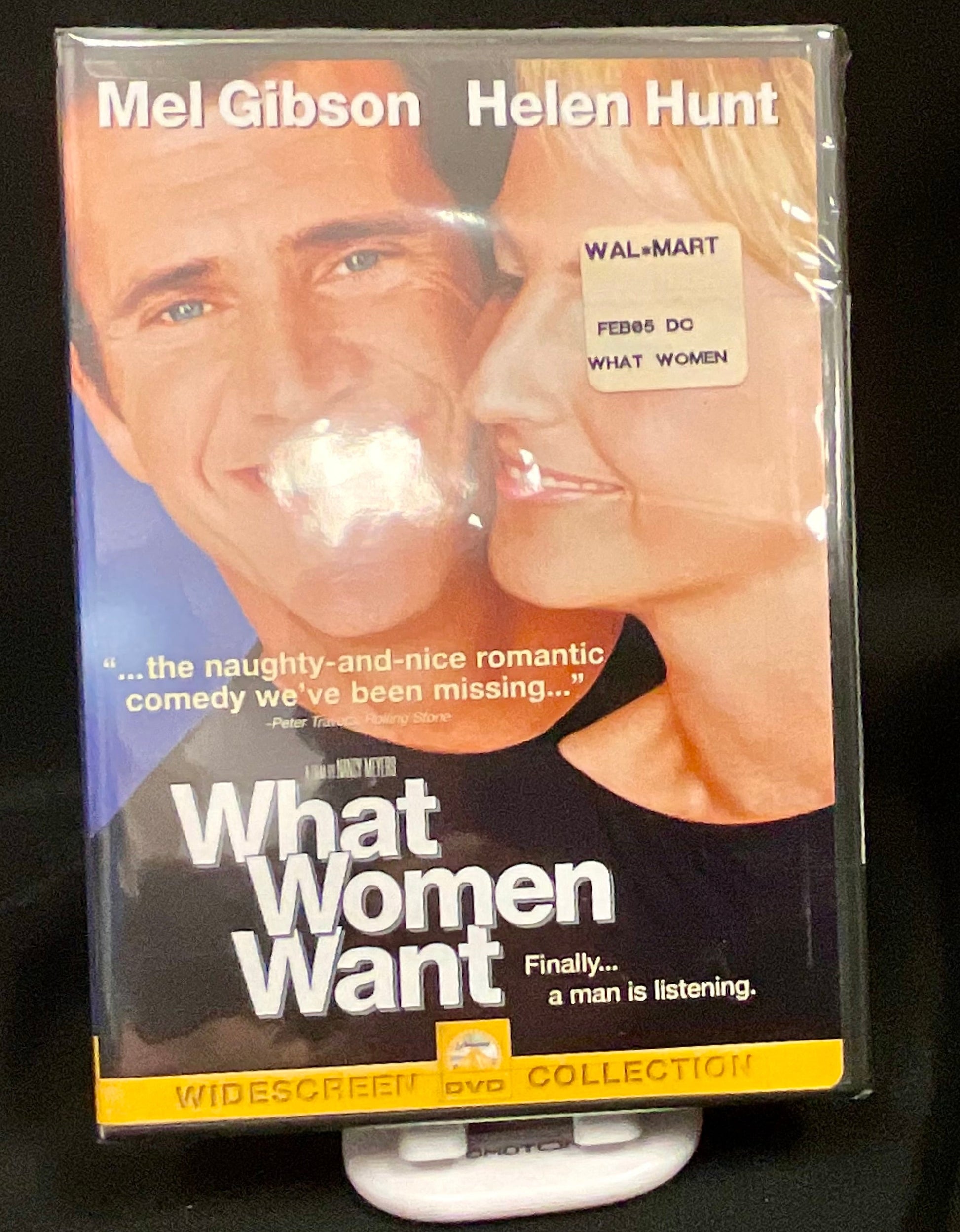 VHS tape cover of 'What Women Want' with Mel Gibson and Helen Hunt on a black background